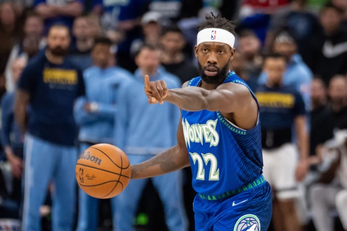 Minnesota Timberwolves guard Patrick Beverley (22) signals his team against the Memphis Grizzlies in the third quarter during game one of the three round for the 2022 NBA playoffs at Target Center.